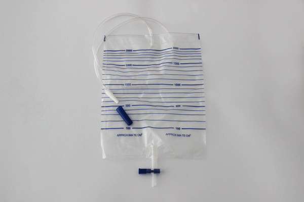 Disposable urine bag with T-tap valve