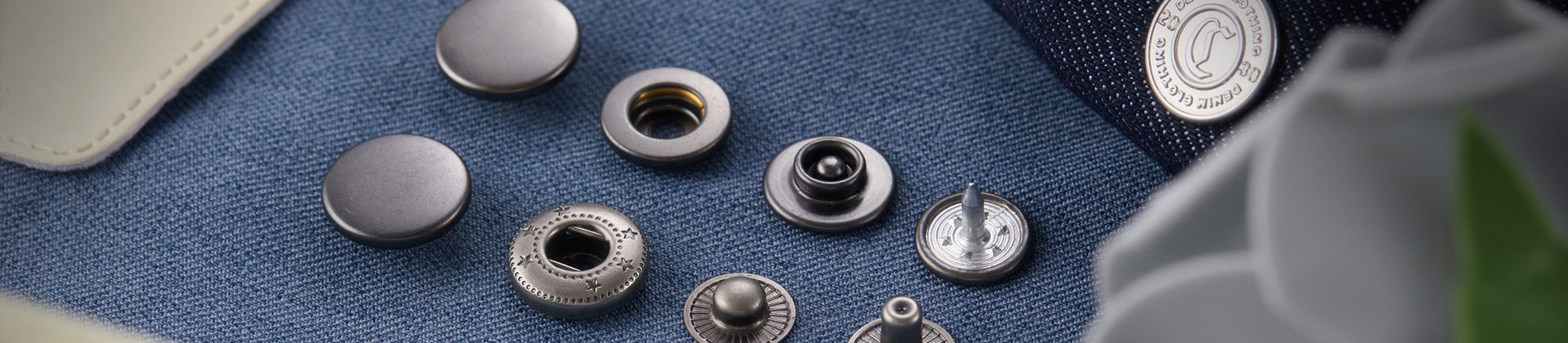 Is the jeans tack button made of metal